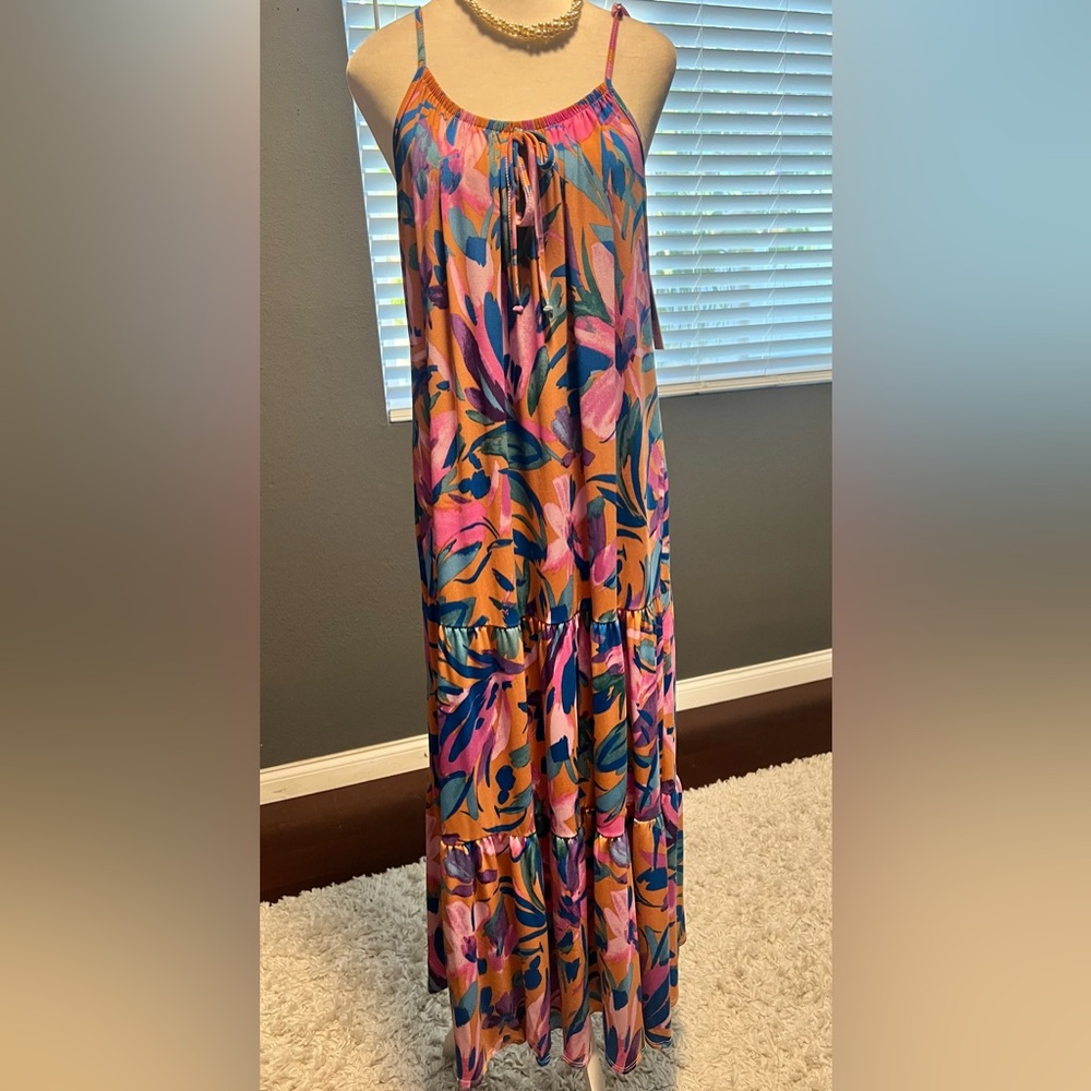 Floral Maxi Dress in Pink and Blue. Tiered bottom With Adjustable straps.